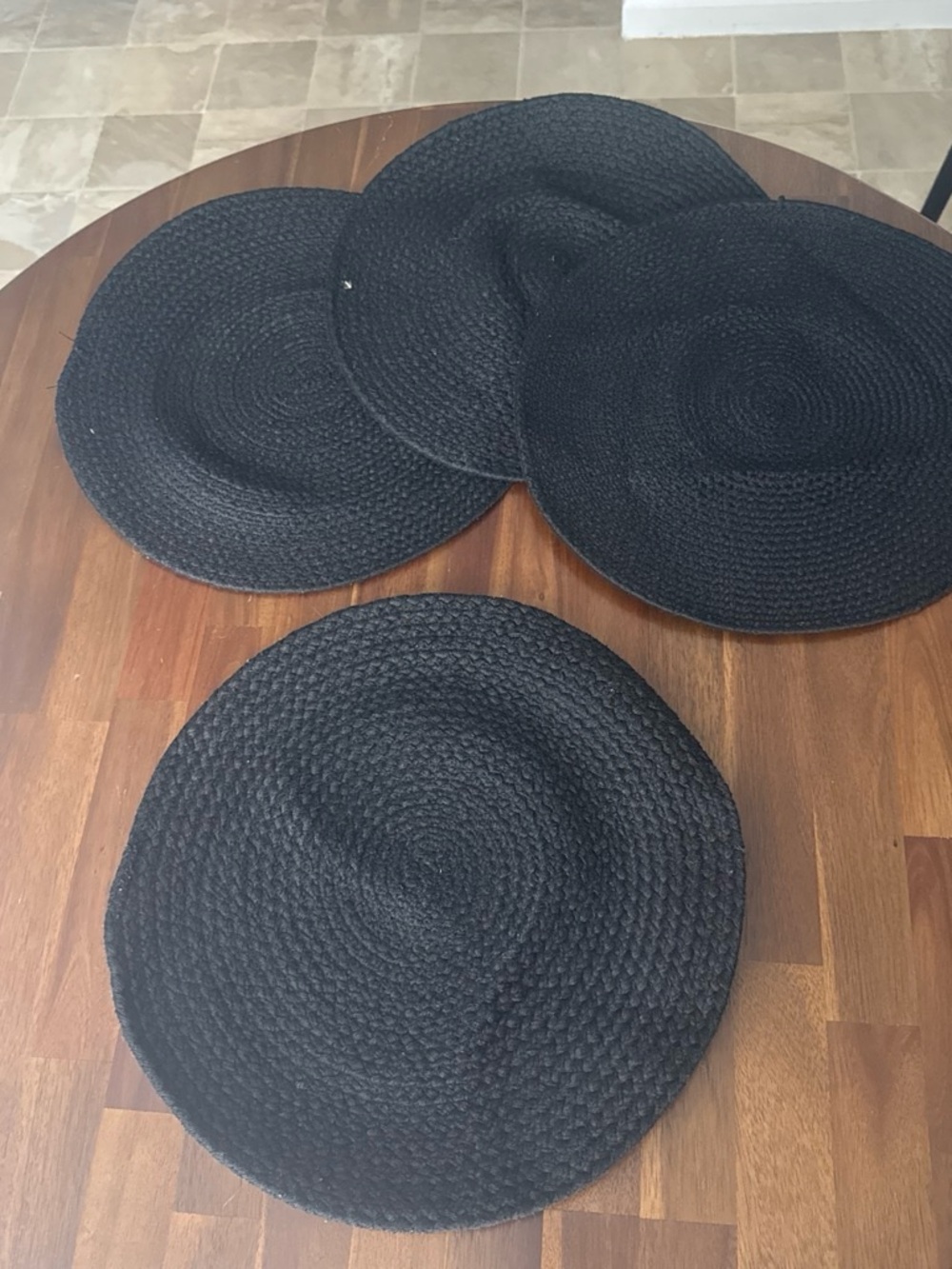 Source Unknown Black round woven set of 4 Placemats